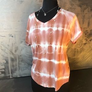 Handmade tie dye rolled sleeve t shirt in peach